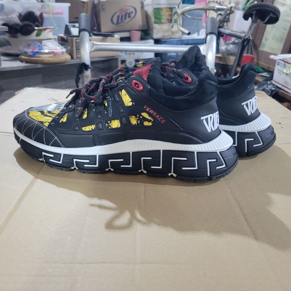Elevate your sneaker game with these stylish Versace Trigreca sneakers....